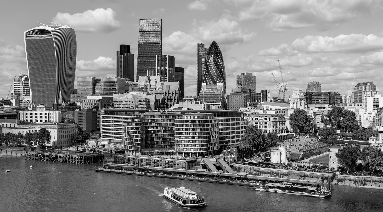 The City of London skyline seen across the River Thames, in black and white